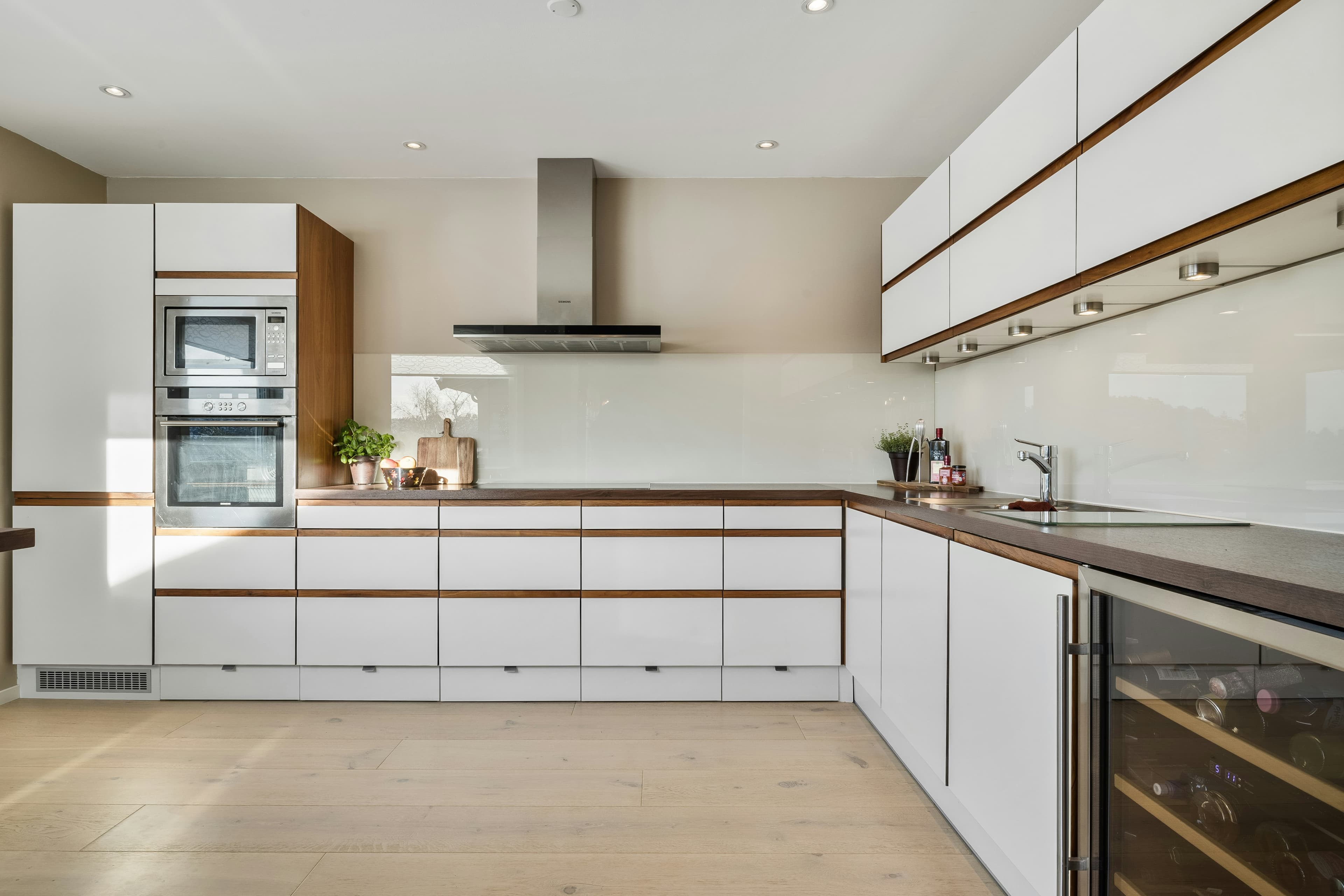 bright interior with large windows and warm lighting